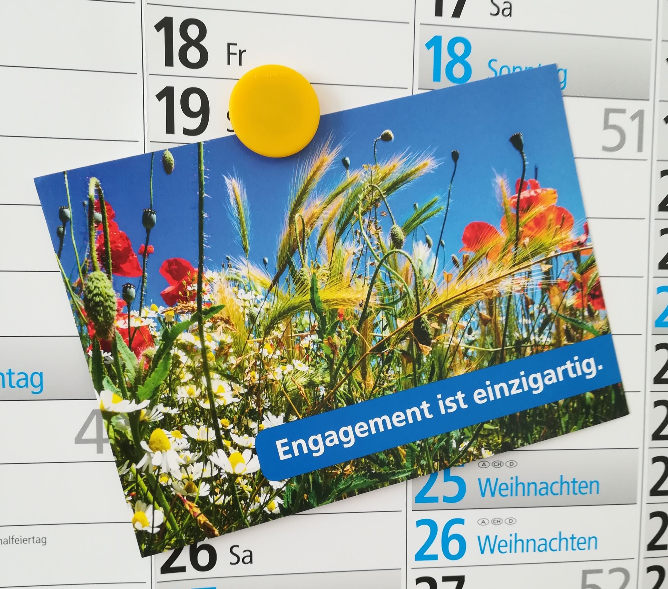 Kalender mit Postkarte "Engagement ist einzigartig"
